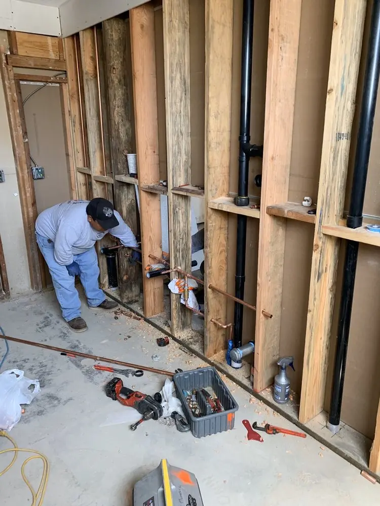 Commercial rough-in plumbing for Water Heater Replacement in Seward Park
